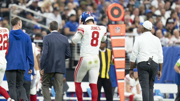 November 5, 2023; Paradise, Nevada, USA; New York Giants quarterback Daniel Jones (8) walks to the sideline after an injury against the Las Vegas Raiders during the second quarter at Allegiant Stadium.